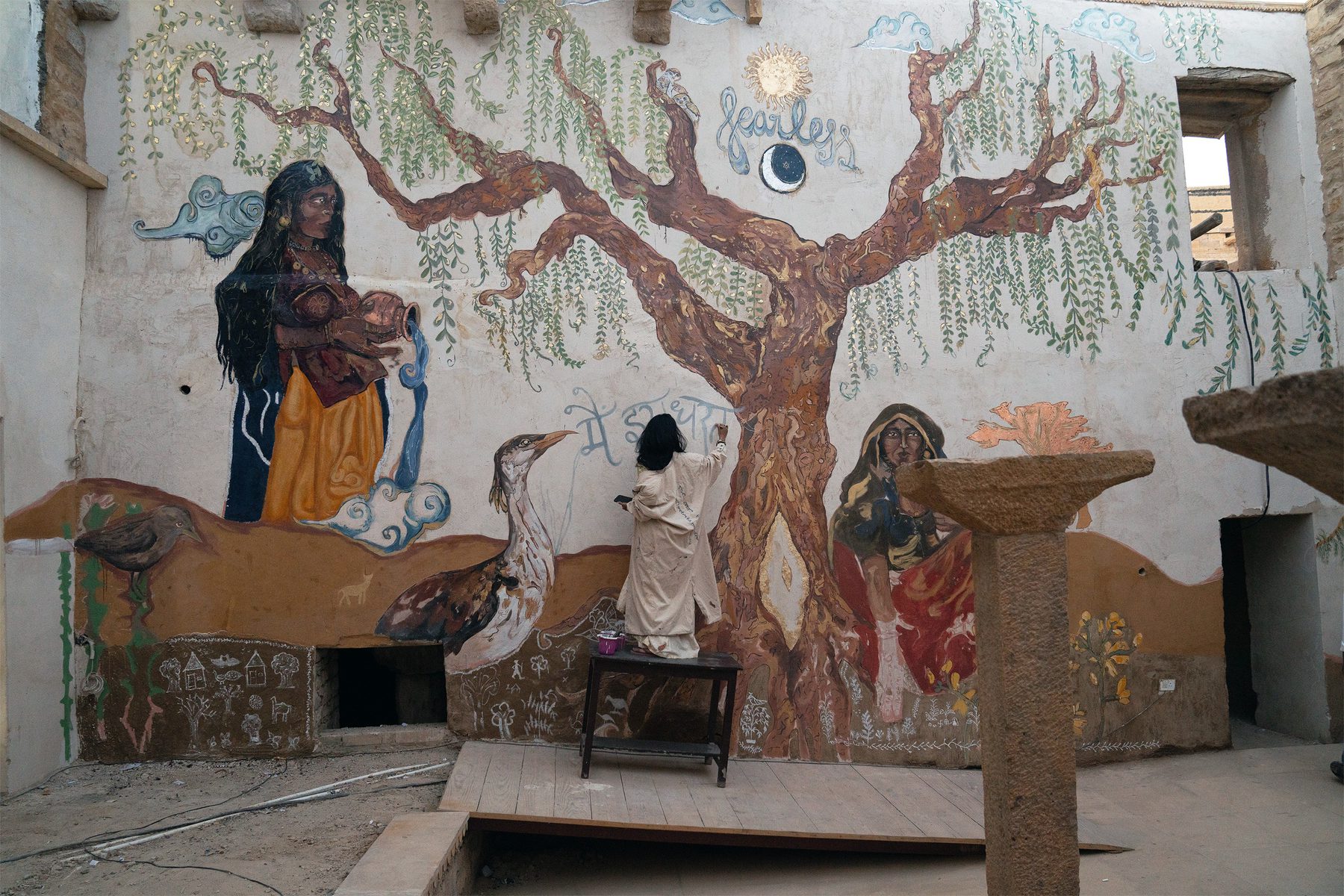 a hand painted mural of a tree